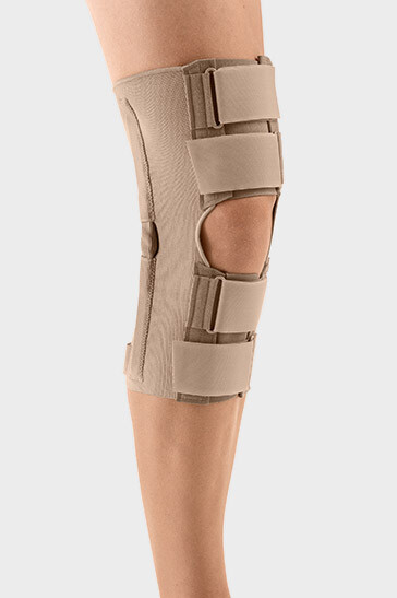 Knee with Velcro fasteners with diverting loops for individual compression adjustment