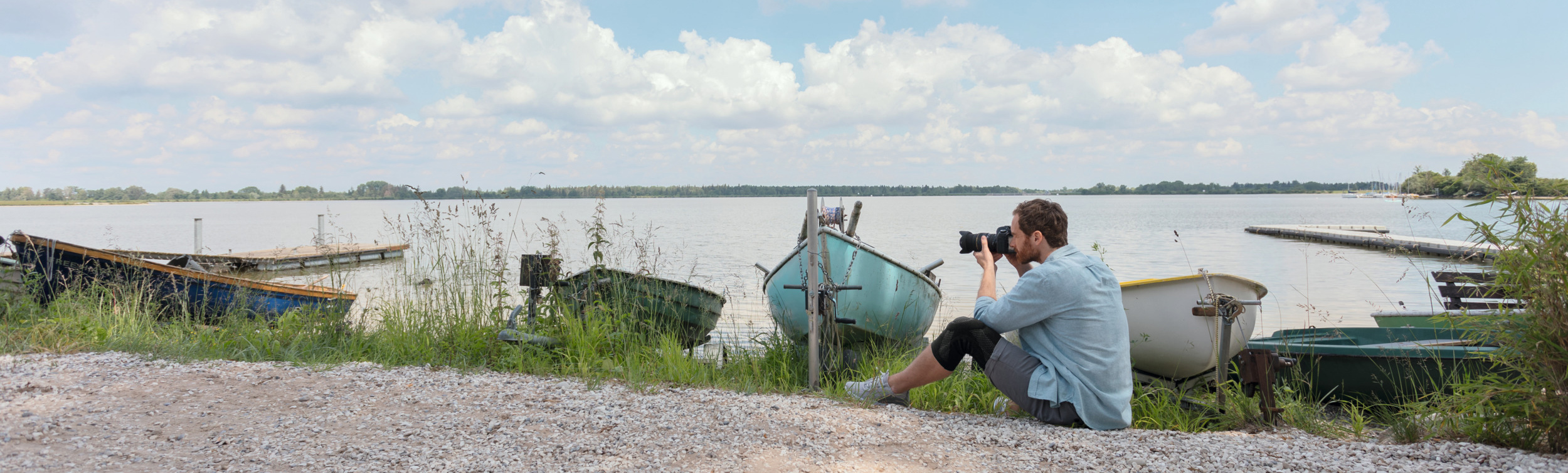 Photographe au bord d'un lac avec JuzoFlex Genu Xtra Photographe au bord d'un lac avec JuzoFlex Genu Xtra